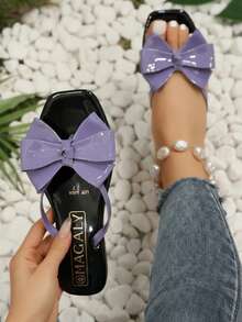 Sandalia de mujer elegante con lazo grande, punta cuadrada, tiras de charol, estilo casual de verano, ideal para playa y diario - Morado - Ver 1