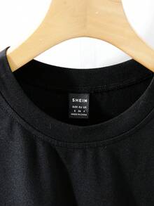 GlowEve Women's Autumn/Winter Knitted Elastic Round Neck Asymmetric Peplum Hem Colorblock Casual T-Shirt - Black and White - View 7