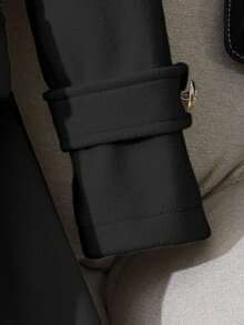 Sparklyn 一件少女款独特腰部设计中长长袖外套，优雅时尚，适合秋冬季户外穿着。