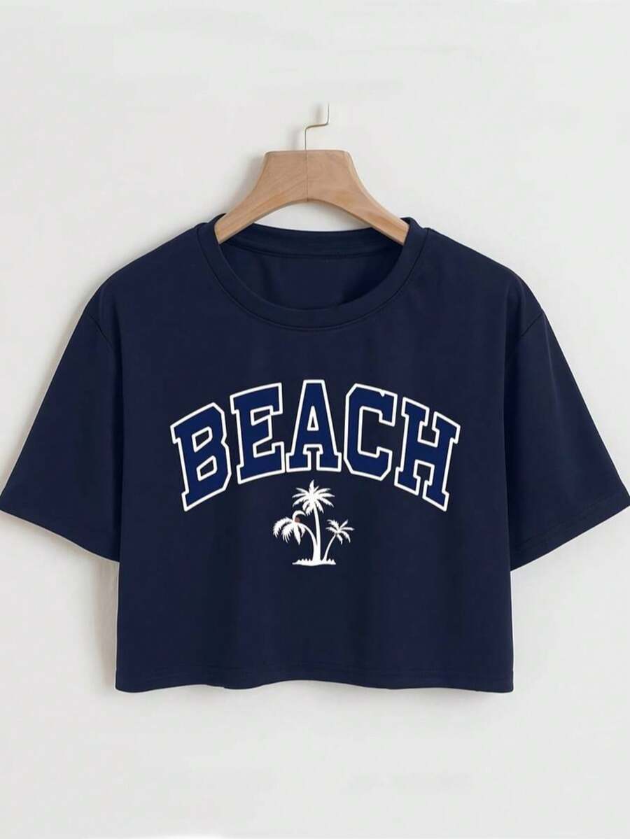 Camiseta para mujer estilo casual playa estampado letras BE BEACH tela suave oversize cuello redondo manga corta primavera/verano uso diario crop top - Azul Marino - Ver 1
