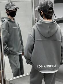 Mirajuku 两件套休闲青少年男童简约英文字母连帽衫和松紧腰抽绳裤套装，宽松版型，舒适百搭，适合秋季、春季、冬季日常穿着、通勤、户外、运动、上学、街头风、派对、摄影等场合。