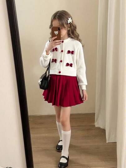Elladie kids 女童可爱休闲日常针织开衫外套，搭配装饰配饰，搭配红色半身裙，秋冬季开学季两件套。华夫格纹理，宽松舒适设计，适合春秋季节、日常通勤、户外玩耍和社交活动。