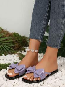 Sandalia de mujer elegante con lazo grande, punta cuadrada, tiras de charol, estilo casual de verano, ideal para playa y diario - Morado - Ver 3