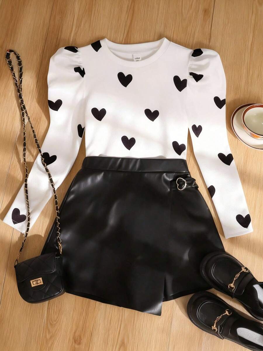 SHEIN Tween Girl Casual Elegant Heart Print Puff Sleeve Round Neck T-Shirt And PU Patch Asymmetrical Hem Heart Metal Button Skort PU Shorts 2 Pieces Set, Black & White PU Shorts Outfit Black And White Clothes For Tween Girls Cute Cheap Clothes Teen Girl Outfits Sets Girls Outfit Sets 13 Cute Outfit Bundles For Teen Girls - Black - View 1