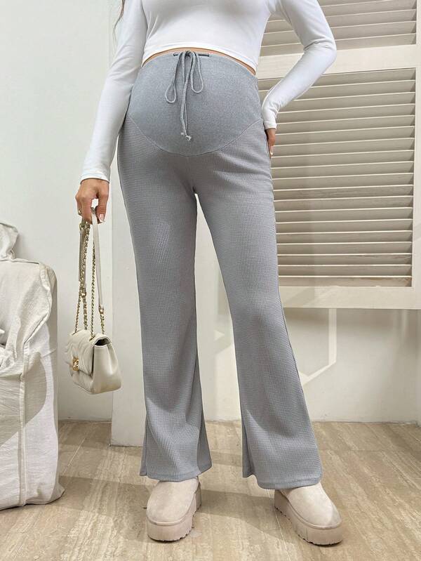 SHEIN Pantalones de maternidad acampanados de punto de gofre con cintura ajustable, cómodos y casuales