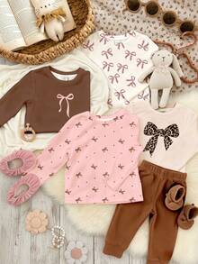 SHEIN Bộ 4 chiếc/Bộ màu trắng kem, kem be, kem hồng, nơ da báo cổ điển, nơ chấm bi mini họa tiết thường ngày, áo thun dài tay ấm áp cổ tròn, thích hợp mặc hàng ngày vào mùa thu/đông, thoải mái dễ chịu, nhiều lớp áo mùa thu & đông cho bé gái, trẻ em sành điệu, trang phục thường ngày, áo thun họa tiết nơ trẻ em, quần áo mùa thu & đông, mùa thu sang trọng, thời trang mùa đông, phong cách mới - Nhiều màu - Xem 3
