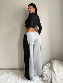 SHEIN SXY مجموعة من قطعتين للمرأة ذات الحجم الكبير، تي شيرت أسود قصير الأكمام وبنطال رمادي وأسود واسع الساق وعالي الخصر، مناسب للعطلات والمواعيد والارتداء اليومي والمنزلي في فصل الخريف والشتاء - متعدد الألوان - مشاهدة 2