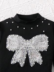 SHEIN 少女黑色串珠蝴蝶结装饰长袖上衣搭配黑色格子不对称下摆半身裙套装，时尚优雅，适合派对、活动和日常穿着。 - 黑色 - 查看 5