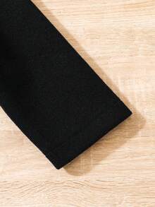 SHEIN Young Girls' Black Double-Breasted Peter Pan Collar Woolen Coat On