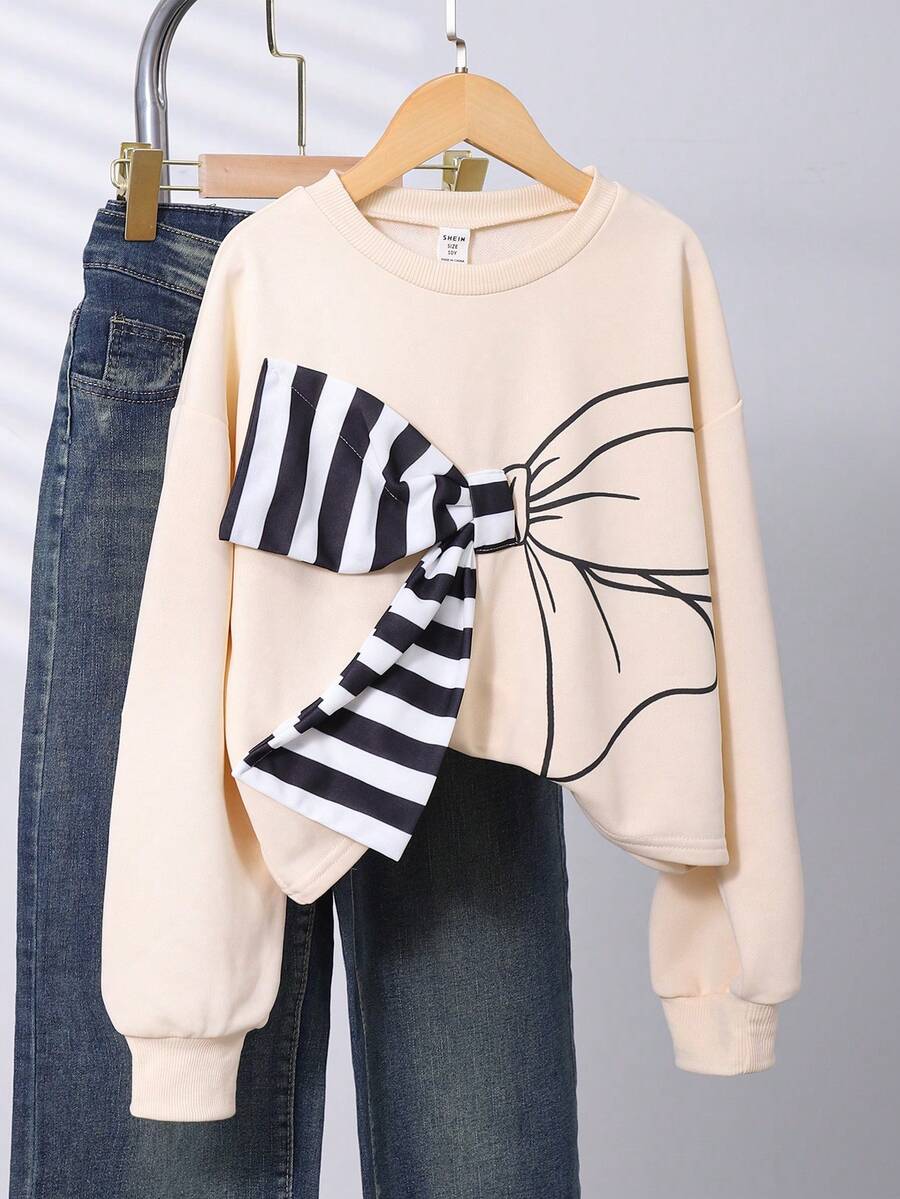 SHEIN 女童可爱蝴蝶结印花卫衣，宽松长袖3D条纹蝴蝶结上衣，适合休闲外出和聚会 - 杏色 - 查看 1