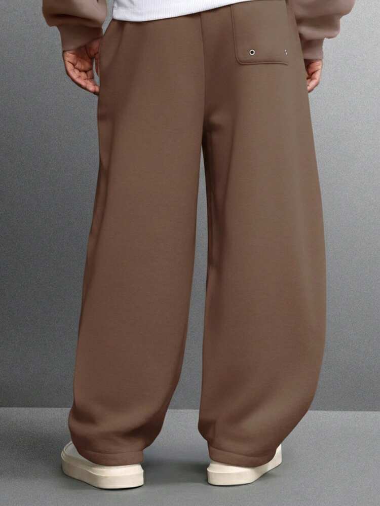 Pantalones deportivos holgados con bolsillos laterales