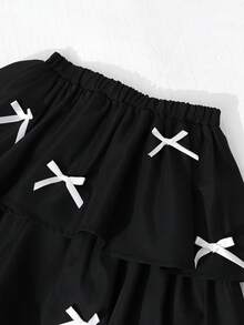 SHEIN 少女时尚优雅T恤套装，白色针织上衣搭配黑色梭织蛋糕裙，上衣饰有黑色蝴蝶结，裙子饰有珍珠。 - 白色 - 查看 3