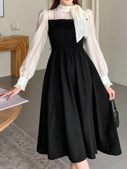 少女女孩黑色纯色撞色拼接杏色蝴蝶结装饰优雅长袖荷叶边中长连衣裙适合春秋冬季秋冬内搭