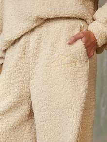 Athîral 2025 冬季新款保暖内衬裤 - Off Piste 标语泰迪熊抓绒慢跑裤，蓬松裤，阔腿运动裤，保暖舒适的运动休闲裤，宽松女裤，适合女性健身、滑雪和圣诞假期冬季穿着。 - 米色 - 查看 1