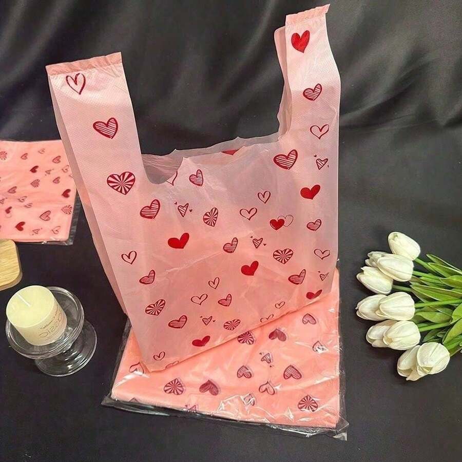 50个粉色可爱情人节塑料T恤袋,粉色散装塑料袋,粉色可爱爱心塑料袋,珠宝包装袋,感谢袋,购物袋,外带袋,外卖袋,超市包装袋,手提包汽车垃圾袋,包装袋,商品袋 - 彩色 - 查看 1