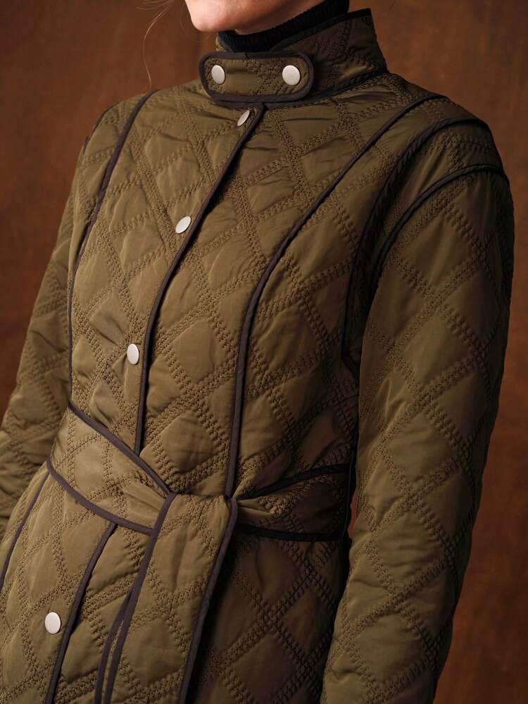 WOMEN'S HIGH COLLAR CONTRAST PIPING BELTED LONG QUILTED WINTER COAT