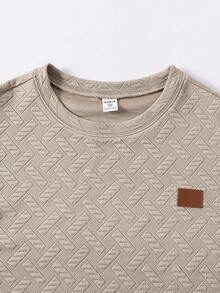 قميص تي شيرت رجالي صيفي بأكمام قصيرة بتصميم هندسي منسوج بنمط الشارع الرياضي الكاجوال بشعار مطرز صغير بياقة دائرية فضفاض - كاكي - مشاهدة 3