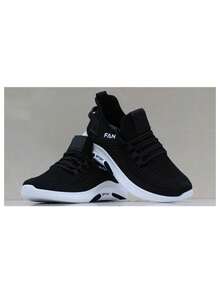 Zapatillas deportivas de moda para hombre de color sólido, ligeras y transpirables de malla de tela, talón suave y cómodo para proporcionar estabilidad, diseño de suela elástica antideslizante de alta amortiguación para una mejor protección de los pies, adecuadas para caminar, deportes al aire libre, correr, hacer ejercicio, fitness, fiesta, fiesta, uso diario
Zapatillas deportivas de hombre en textil ligero y transpirable, de estilo casual con cordones y puntera redonda pequeña - Negro - Ver 8