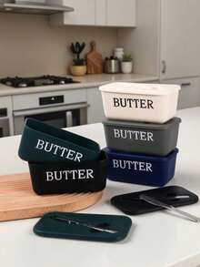1个PP材质黄油碟，带盖和刀，碟身印有“BUTTER”字样，可保持黄油新鲜，方便日常早餐和烘焙使用。 - 彩色 - 查看 2