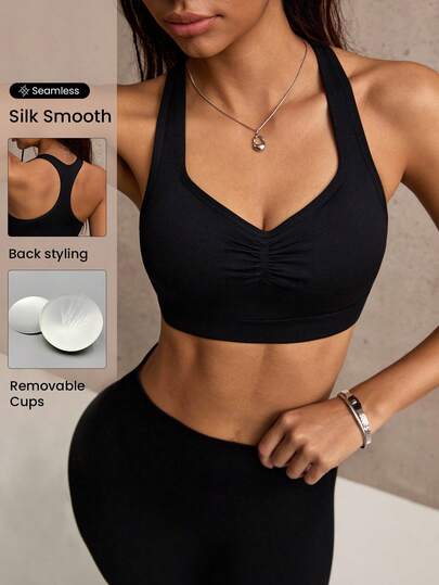 Dewbera Sujetador deportivo inalámbrico de unicolor y diseño de espalda de tirantes finos para mujer