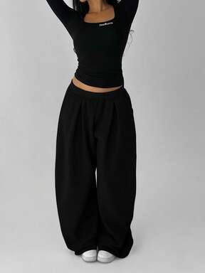 FavEase Pantaloni casual da donna in pile con vita elastica e pieghe, di colore unito