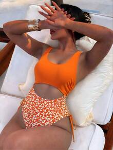 Costavie 2025豹纹拼布镂空连体泳衣，随机印花