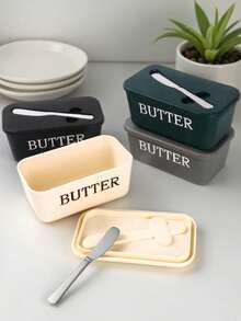 1个PP材质黄油碟，带盖和刀，碟身印有“BUTTER”字样，可保持黄油新鲜，方便日常早餐和烘焙使用。 - 彩色 - 查看 4
