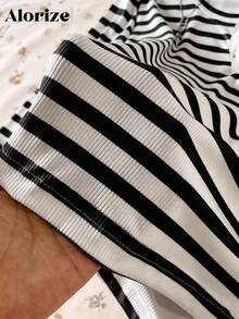 女童休闲条纹V领长袖T恤，百搭实用，适合散步、购物、工作、上学、旅行，可搭配外套、马甲、裤子、运动裤等。 - 黑與白 - 查看 4