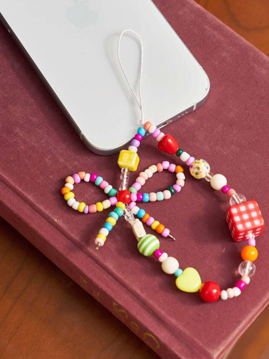 Joivida Cordón para teléfono celular hecho a mano con moño colorido, diseño de dopamina, correa para cámara de cuentas DIY, cuerda antiórdida para teléfono, bolsa para auriculares, colgante para bolsa, para adolescentes, diseño original - Rojo - Ver 1