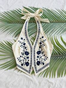 Soleia 杏色底黑色花卉刺绣露背吊带短款上衣，带蝴蝶结，适合音乐节穿着。 - 彩色 - 查看 6