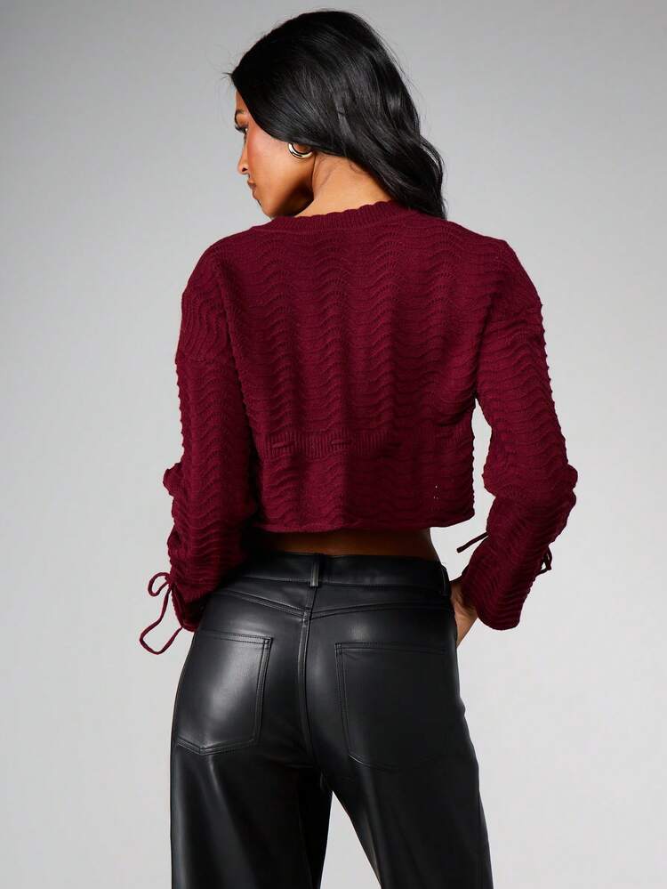 MISSGUIDED Cardigan court tricoté en câble bordeaux avec boutons devant et détail de cordon coulissant. Pull d'hiver pour l'automne et Noël