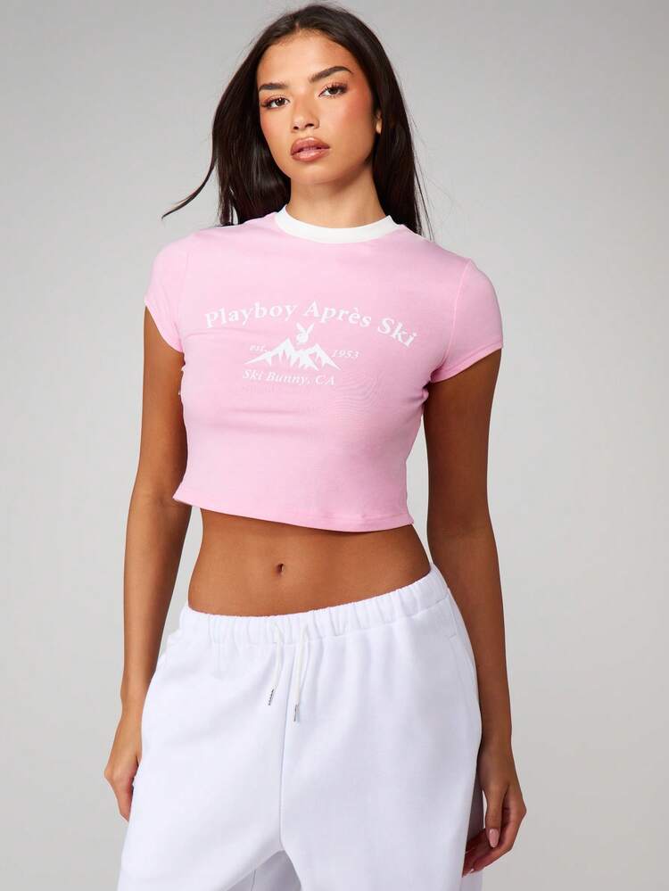 Missguided x Playboy Apres Ski Graphic Baby Tee Short Sleeve Crop Top With White Contrast Trim Mountain Print