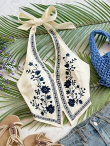 Soleia 杏色底黑色花卉刺绣露背吊带短款上衣，带蝴蝶结，适合音乐节穿着。 - 彩色 - 查看 5