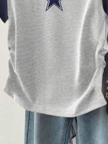 少女夏季新款星星图案印花插肩袖腰部剪裁 T 恤，简约