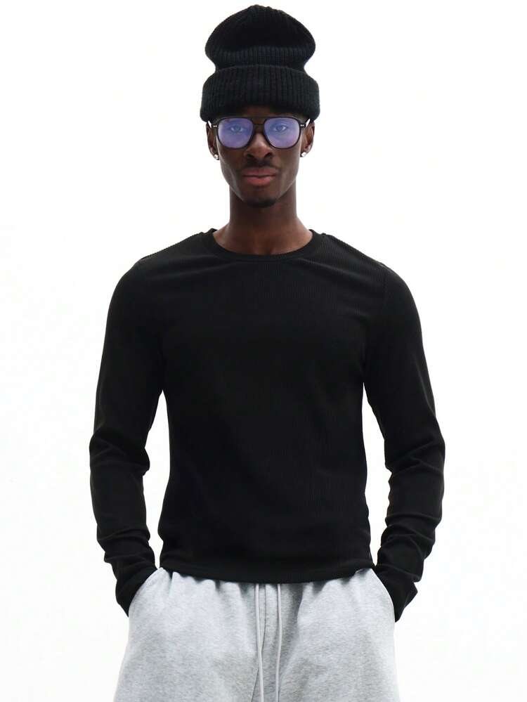 T-shirt à manches longues et col rond coupe ajustée