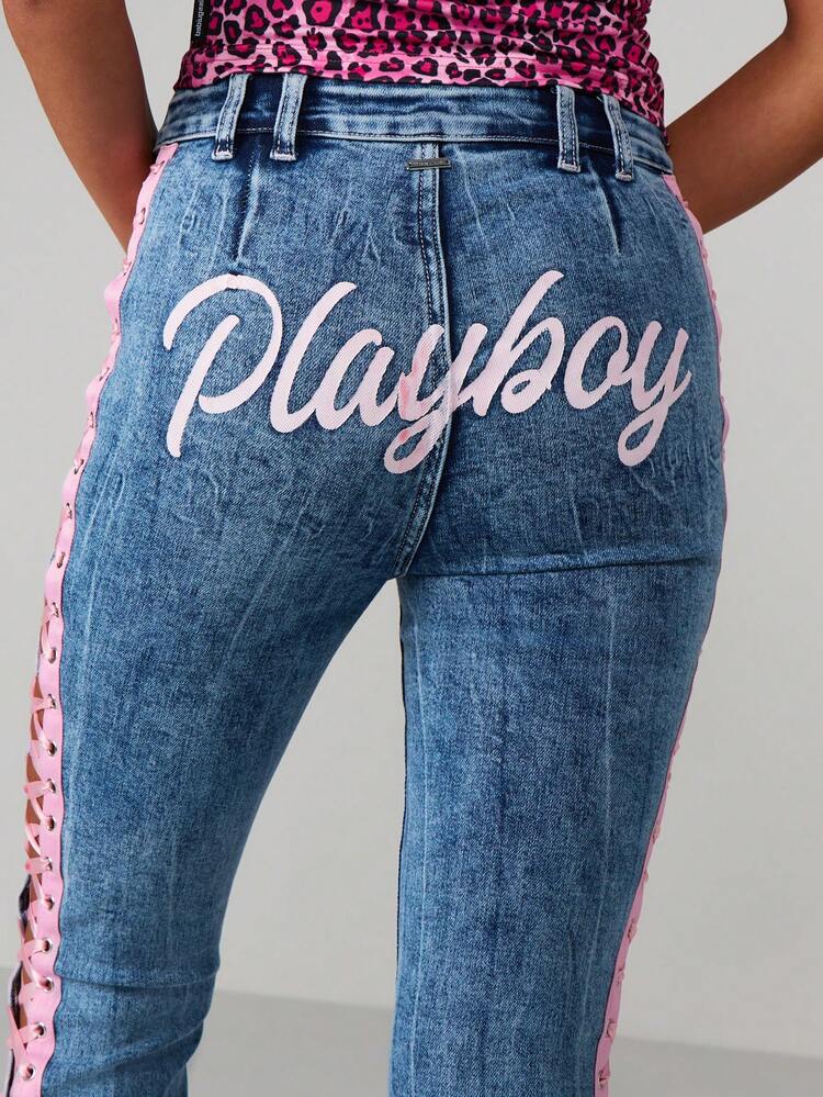 Missguided x Playboy High Rise Flared Jeans With Lace Up Side Detail And Text Print