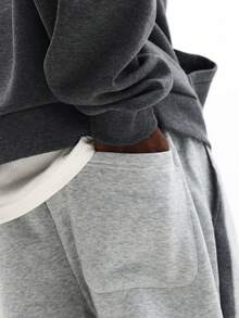 Quần jogger dáng ống loe SUMWON với chi tiết sọc bên hông, kiểu dáng thoải mái, năng động, thích hợp mặc hàng ngày. Màu trơn. - Xám - Xem 7