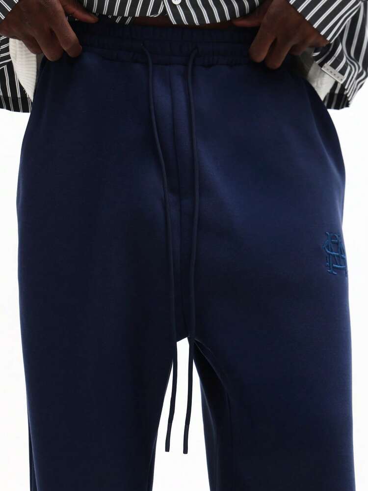 Pantalón deportivo de corte recto con logotipo bordado