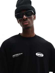 SUMWON Camiseta de algodón de manga corta con cuello redondo, ajuste regular, con estampado de lema en capas y diseño de texto inspirador y estampado en la espalda para un estilo casual y urbano de uso diario - Negro - Ver 3