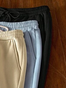 Manfinity Unisex 4件套男士针织休闲宽松纯色短裤，百搭日常穿着，青春时尚，情侣装 - 彩色 - 查看 4