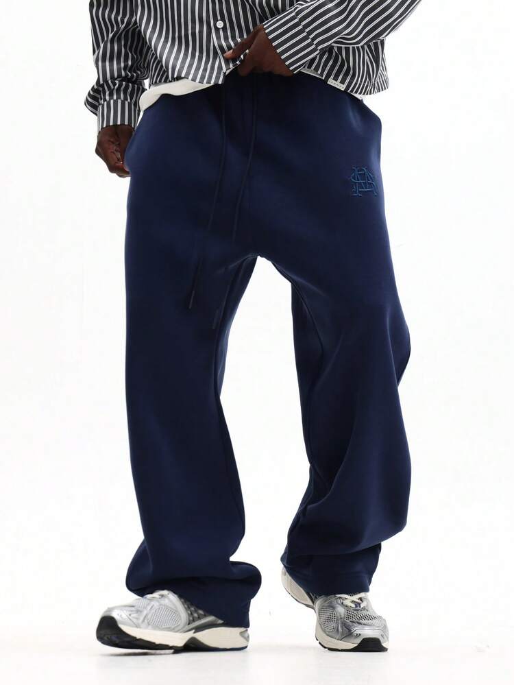 Pantalón deportivo de corte recto con logotipo bordado
