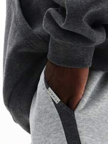 Quần jogger dáng ống loe SUMWON với chi tiết sọc bên hông, kiểu dáng thoải mái, năng động, thích hợp mặc hàng ngày. Màu trơn. - Xám - Xem 6