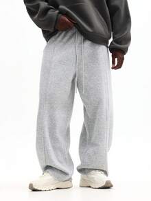 Quần nỉ SUMWON dáng rộng thoải mái với bo chun ở gấu quần, thích hợp mặc ở nhà và thư giãn cuối tuần. Màu trơn. - Màu Xám nhạt - Xem 5