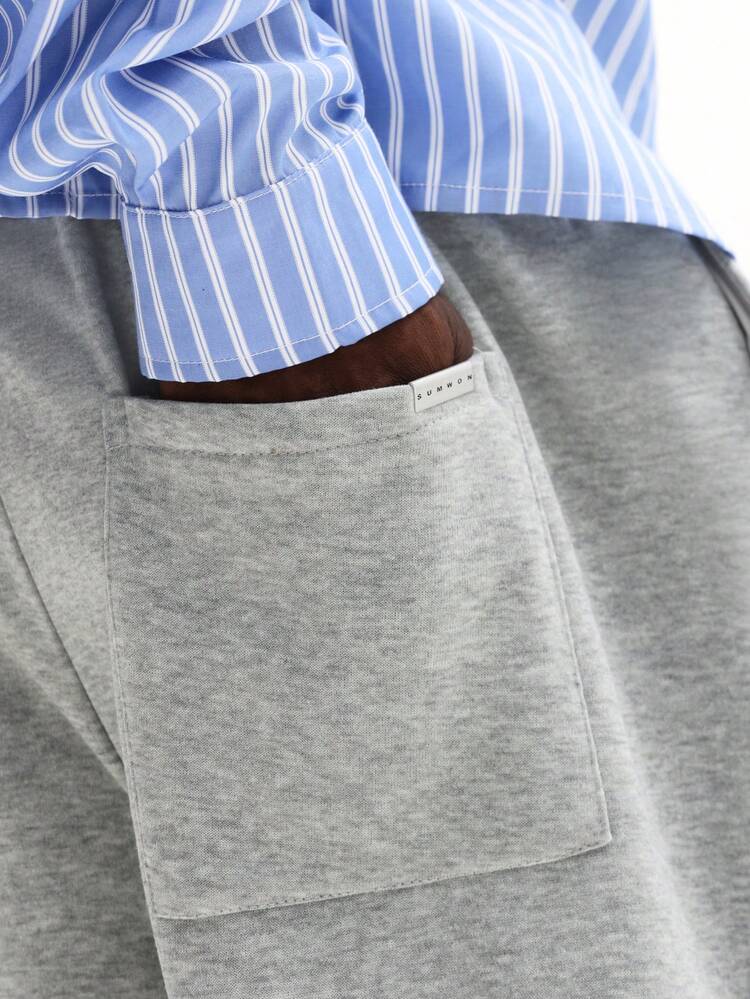 Straight Fit Sweatpants With Embossed Detail