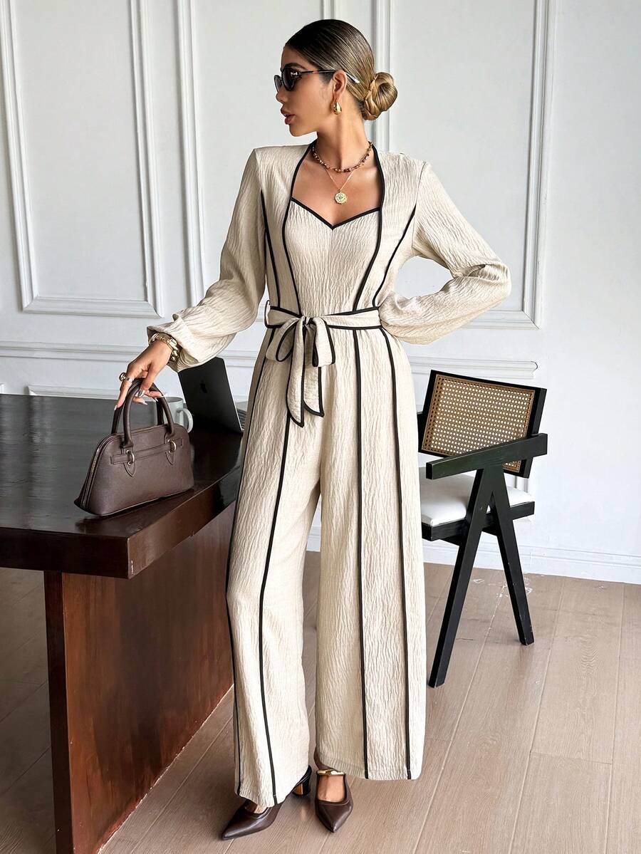 SHEIN Frenchy Herbst-Winter 2025 Damen Mode Lässiger Kontrast-Farbakzent Jumpsuit, Langarm Jumpsuit für Frauen, Damen Jumpsuits, Kontrast-Farbakzent Jumpsuit, Leinen Jumpsuits, Taillengürtel Jumpsuit, Eleganter Jumpsuit für Frauen, Brunch Outfit, Winteroutfits für Frauen, Stilvolle Bekleidungskollektion, Französischer Stil Kleidung, Silvester Outfit, Weihnachten, Thanksgiving Outfit für Frauen, Lässiges Outfit für Frauen, Vintage, Minimalistisch, Pendler, Büro, Perfekt für den Alltag - Aprikosenfarben - Übersicht 1