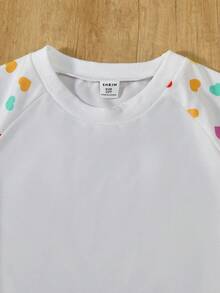 SHEIN 2pcs Tween Girl Set: Round Neck Raglan Sleeve Heart & Ditsy Floral Sweatshirt + Leggings - White - View 5