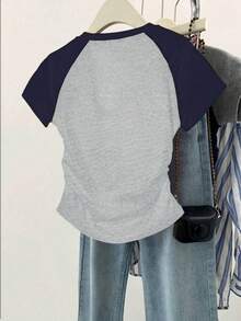 少女夏季新款星星图案印花插肩袖腰部剪裁 T 恤，简约