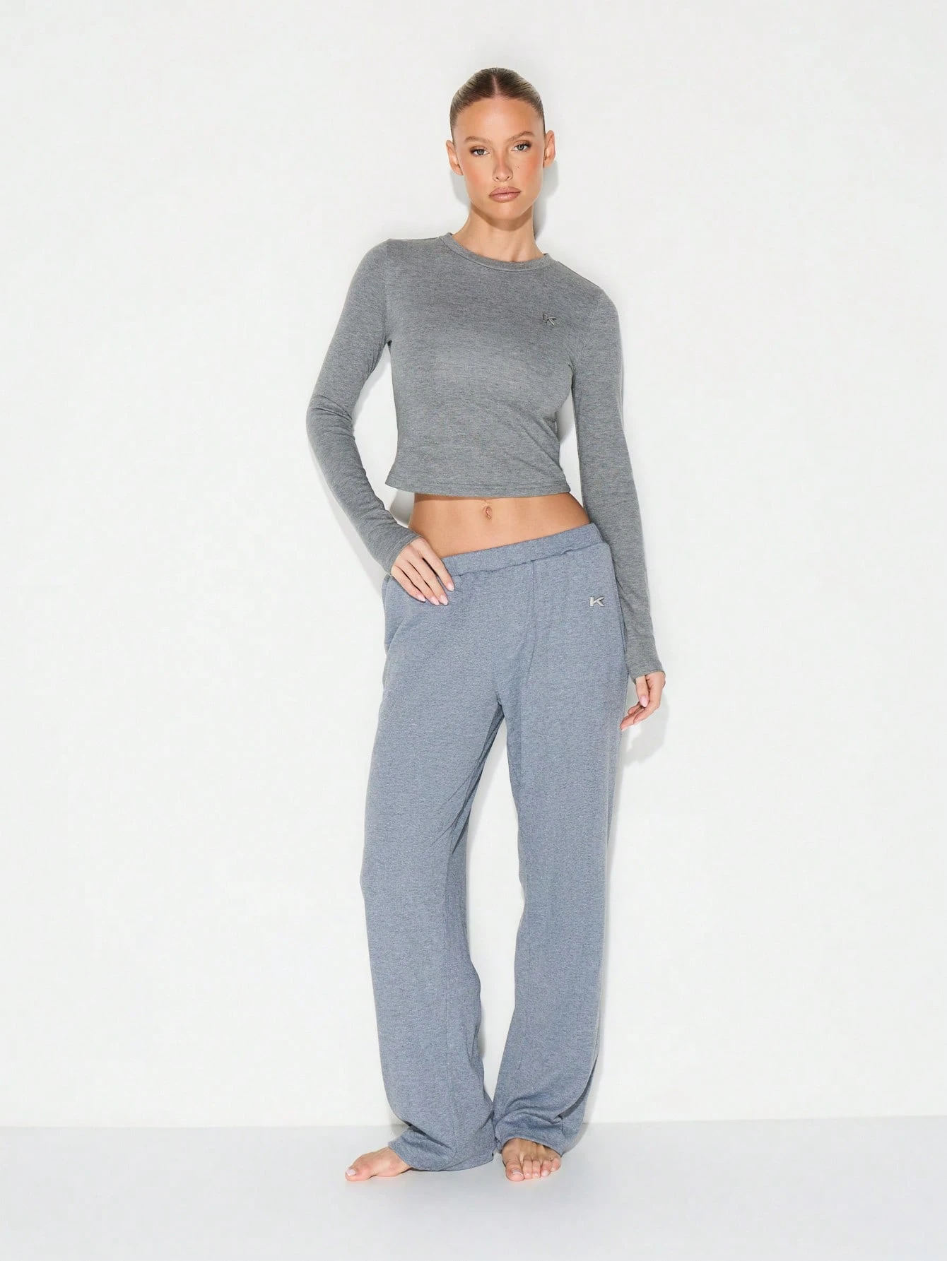 KIZN 메탈 탭 디테일이 있는 헤더드 스웨트팬츠