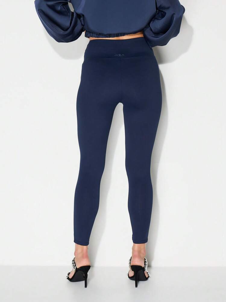 KIZN Mallas deportivas de cintura alta con detalle de logo para un estilo de vida activo, yoga y entrenamiento físico