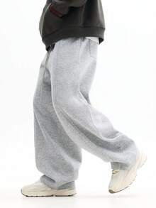 Quần nỉ SUMWON dáng rộng thoải mái với bo chun ở gấu quần, thích hợp mặc ở nhà và thư giãn cuối tuần. Màu trơn. - Màu Xám nhạt - Xem 2